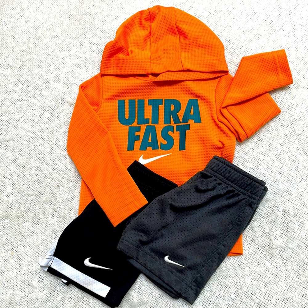 Nike Size 2t set. Dri-fit hooded long sleeve top with two pairs of shorts.